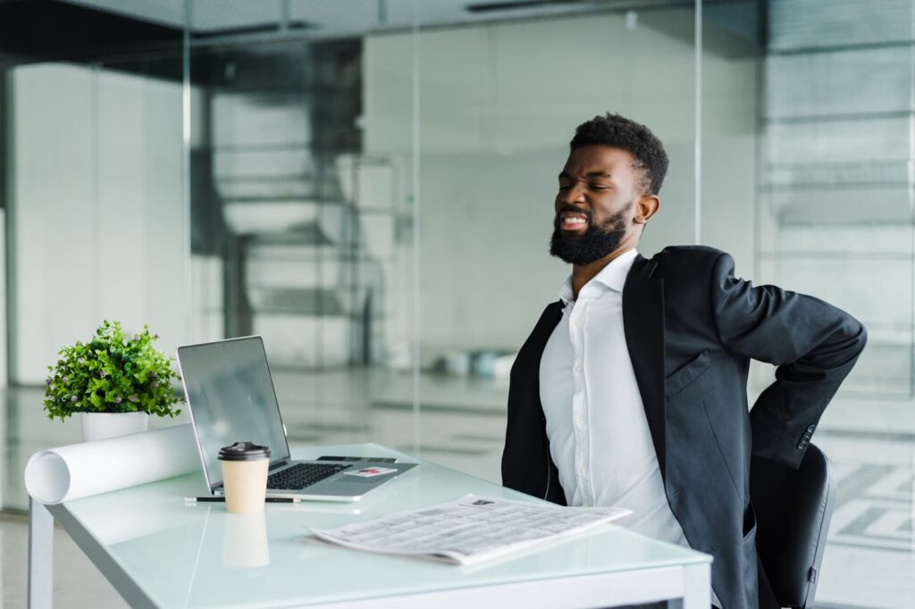 Employee maintaining ergonomic posture
